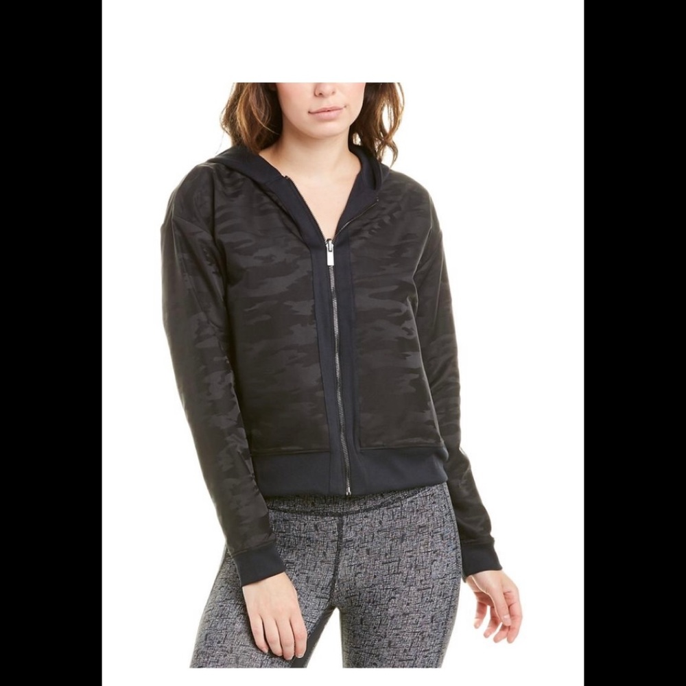 NEW BALANCE
WOMEN'S DETERMINATION REVERSIBLE JACKET